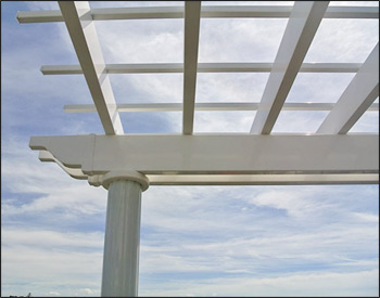 14 x 14 Vinyl 2-Beam Wall Mount Pergola shown with No Deck, 6" Round Fluted Columns, 12" Top Runner Spacing, Stainless Steel hardware, and Rush Delivery