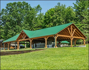 24 x 62 Grand Ridge Retreat shown with 10 tall 7"x7" posts, Evergreen Metal Roof, Short Post Trim, and Decorative Beam End Cut.