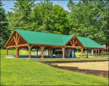 24 x 62 Grand Ridge Retreat shown with 10 tall 7"x7" posts, Evergreen Metal Roof, Short Post Trim, and Decorative Beam End Cut.