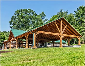24 x 62 Grand Ridge Retreat shown with 10 tall 7"x7" posts, Evergreen Metal Roof, Short Post Trim, and Decorative Beam End Cut.