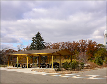 26 x 40 Wood Gable Rectangular Savannah Pavilion shown with Treated Glue Laminated Columns, Glue Laminated Pitch & Tapered Curved Beams, 3:12 Roof Pitch, 2 x 8 Tongue and Groove Roof Decking, #1 Grade 2x6 Treated SYP Fascia, and Prime Painted Steel Connection Plates 	