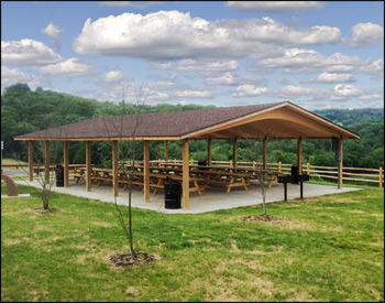 36 x 50 Wood Gable Savannah Pavilion shown with treated pine glue laminated columns, Asphalt shingles, 2x8 tongue and groove decking, powder coated fastener plates. 