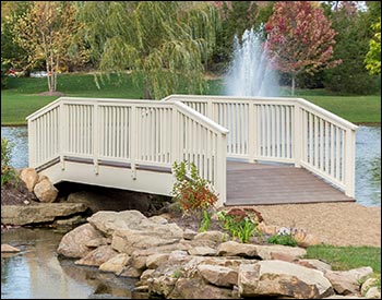  6 x 20 Straight Spindle Rail Bridge shown with Ivory Vinyl Railings, Madiera Trex Deck, Continuous Handrail, 36" High Rails, and Ivory Vinyl Beam Wrap.