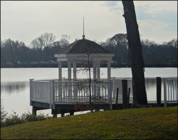 8 Vinyl Hexagon Belle Gazebo shown with No Deck, Weathered Wood Asphalt Shingles, No Fan, 40" Copper Finial, and Stainless Steel Hardware. 