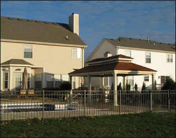 12’ x 24’ Ivory Vinyl Rectangle Gazebo shown with Custom 8” Round columns, No Top Railing, No Floor, Custom Copper Roof Cupola, Finished Vinyl Ceiling, Cedar Shake Shingles, and Electric Package