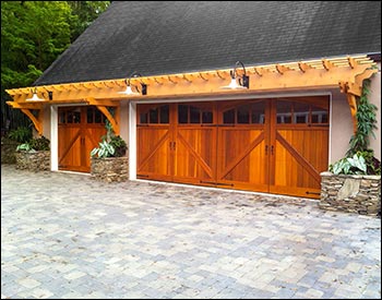 4 x 36 Red Cedar Eyebrow Pergola shown with custom 4 wall brackets, 2x8 spliced header beams, 2x6 runners (16" on center), 1x1 top runners (16" on center) , and customer supplied stain.
