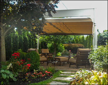 Custom 186" x 156" Vinyl 2-Beam Pergola show with 9 Decorative Posts, 2x12 Header System between posts, 2x8 Header System Centered for Canopy, No Runners, No Top Runners, No Post Trim, and Linen Tweed Retractable Canopy System.