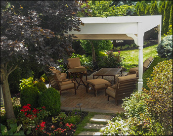 Custom 186" x 156" Vinyl 2-Beam Pergola show with 9 Decorative Posts, 2x12 Header System between posts, 2x8 Header System Centered for Canopy, No Runners, No Top Runners, No Post Trim, and Linen Tweed Retractable Canopy System.