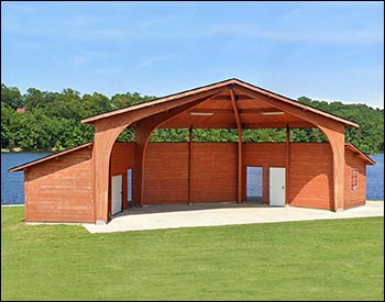 Custom Amphitheater Shown With glued laminated Arches, 2x8 T&G Roof Deck, factory stain, Log wall changing / storage rooms, back, and side walls and fiberglass shingle roofing.