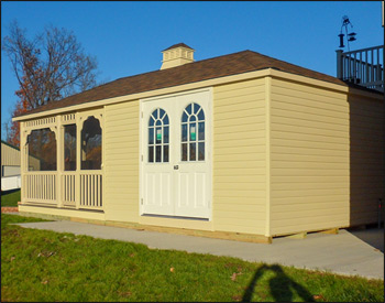 12 x 24 Vinyl Pool House shown with Ivory Vinyl Siding, Ivory Trim, Gray Composite Deck, Standard Railings, 2 - 18" x 36" Windows, 6 Sliding Glass Door & Double Door, Screens, Dual Brown Asphalt Shingles, & Cupola