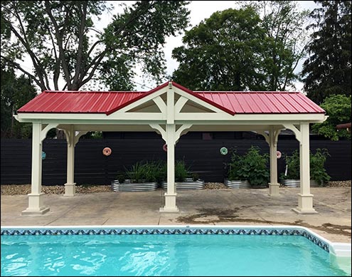 Custom 10 x 24 Treated Pine Gable Ramada with Reverse Gable shown with Navajo White Solid Stain, Dark Red Metal Roof, 8 7"x7" Laminated Posts, Short Post Trim, Treated Pine Tongue and Groove Ceiling (Stained), and Open Gables.