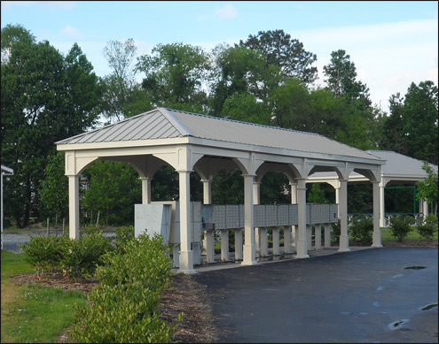 Custom 10 x 40 Vinyl Ramada shown with Elegant Ivory Vinyl, No Deck, 6" Post Trim, 6x6 Posts, 6" Taller Posts, No Cupola, Clay Metal Roof, and Stainless Steel Hardware.