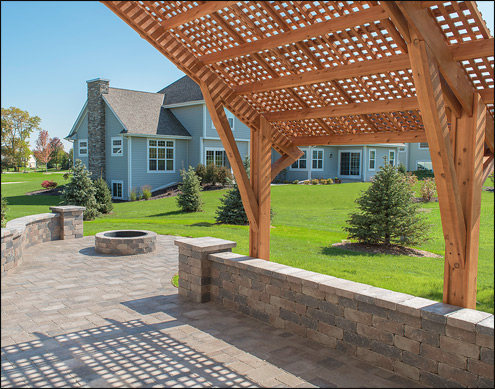 Custom 116 x 10 Canitlever Cedar Free Standing Sloped Pergola shown with Cedar Tone Stain/Sealer and Lattice Top.