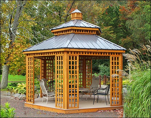 14 Custom Cedar Hexagon Double Roof Gazebo shown with Sandcastle Composite Deck, Custom Lattice Panels, Cupola, and Charcoal Metal Roof.