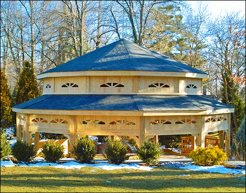 Custom 30 Treated Pine Dodecagon Double Roof Gazebo Shown with 9 Tall Posts, 36" High Solid Bottom Railing, Solid Top Rail, Standard Braces, 4 Track Window System with Screens, Screened Floor, Black Plexiglas at Double Roof, Grey Composite Decking, No Cupola, and Oxford Grey Asphalt Shingles.
