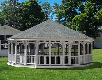 30 Vinyl Dodecagon Gazebo shown with Gray composite deck, 1x1 railings, standard braces, no cupola, full set of screens and screen door, Old English Pewter asphalt shingles, Appliance White Avruc Outdoor Ceiling Fan w/ Light, screened floor, Hidden Wiring w/ 1 Receptacle & Switch, extra receptacle, additional door, straight posts, and top railing sections. 