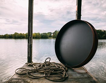 Steel Table Top Lid Shown From the Bottom, Propped up on a Dock.